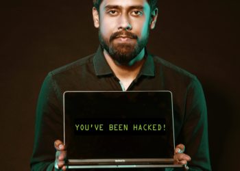 Photo by Saksham Choudhary from Pexels: https://www.pexels.com/photo/man-holding-laptop-computer-with-both-hands-2036656/