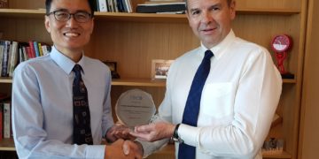 (From left) Professor Pang Hwee Hwa, SMU and Erich Gerber, TIBCO