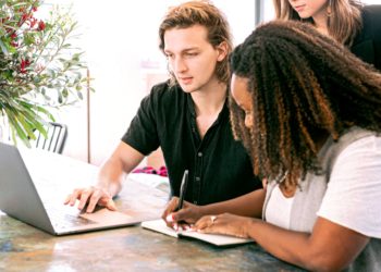 Photo by Canva Studio from Pexels: https://www.pexels.com/photo/man-working-on-laptop-while-woman-takes-notes-3153199/
