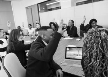 Photo by Christina Morillo from Pexels: https://www.pexels.com/photo/grayscale-photo-of-group-of-people-raises-hands-1181344/