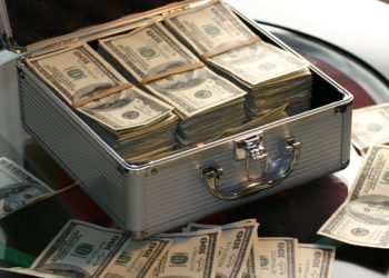 Photo by Pixabay from Pexels: https://www.pexels.com/photo/hard-cash-on-a-briefcase-259027/