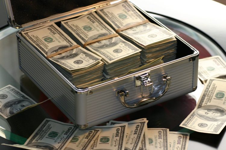 Photo by Pixabay from Pexels: https://www.pexels.com/photo/hard-cash-on-a-briefcase-259027/