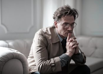 Photo by Andrea Piacquadio from Pexels: https://www.pexels.com/photo/man-in-brown-suit-jacket-sitting-on-white-sofa-3760774/
