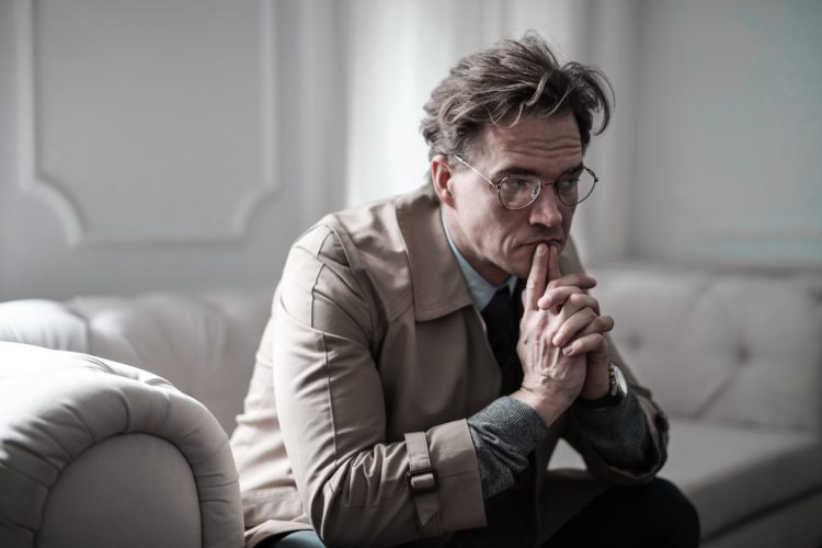 Photo by Andrea Piacquadio from Pexels: https://www.pexels.com/photo/man-in-brown-suit-jacket-sitting-on-white-sofa-3760774/