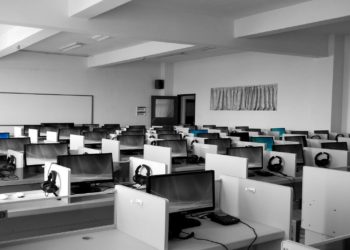 Photo by Pixabay from Pexels: https://www.pexels.com/photo/gray-wooden-computer-cubicles-inside-room-267507/