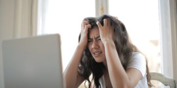 Photo by Andrea Piacquadio from Pexels: https://www.pexels.com/photo/woman-in-white-shirt-showing-frustration-3807738/