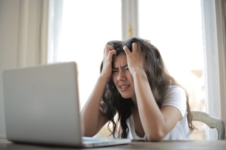 Photo by Andrea Piacquadio from Pexels: https://www.pexels.com/photo/woman-in-white-shirt-showing-frustration-3807738/