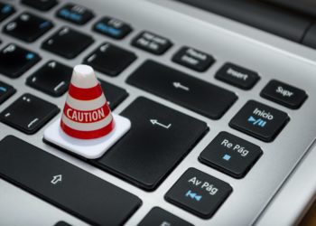 Photo by Fernando Arcos from Pexels: https://www.pexels.com/photo/white-caution-cone-on-keyboard-211151/