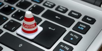 Photo by Fernando Arcos from Pexels: https://www.pexels.com/photo/white-caution-cone-on-keyboard-211151/