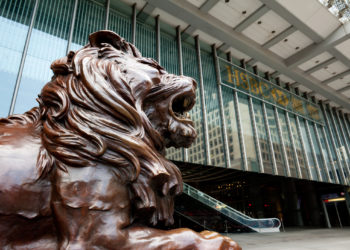 Hong Kong, China - January, 29 2011: Lion sculpture in front of Headquarter of HSBC in Hong Kong.