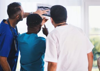 Photo by EVG Kowalievska from Pexels: https://www.pexels.com/photo/three-person-looking-at-x-ray-result-1170979/