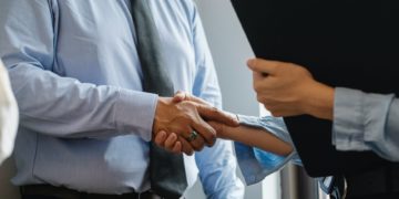 Photo by Sora Shimazaki from Pexels: https://www.pexels.com/photo/man-and-woman-shaking-hands-in-office-5668842/