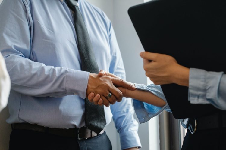 Photo by Sora Shimazaki from Pexels: https://www.pexels.com/photo/man-and-woman-shaking-hands-in-office-5668842/