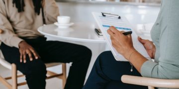 Photo by Alex Green from Pexels: https://www.pexels.com/photo/crop-faceless-multiethnic-interviewer-and-job-seeker-going-through-interview-5699475/