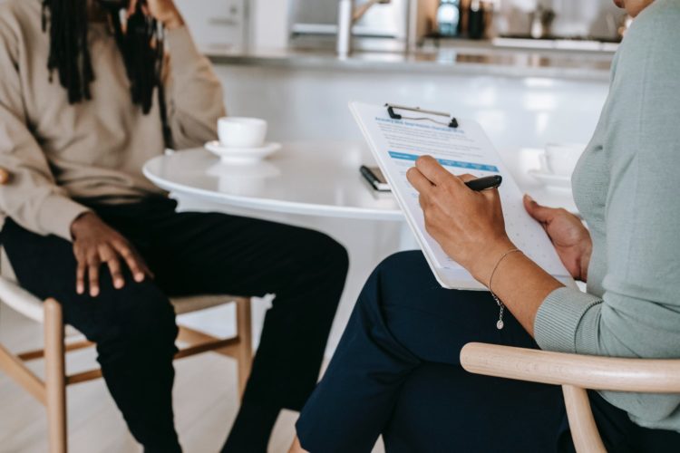 Photo by Alex Green from Pexels: https://www.pexels.com/photo/crop-faceless-multiethnic-interviewer-and-job-seeker-going-through-interview-5699475/