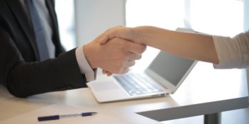 Photo by Andrea Piacquadio from Pexels: https://www.pexels.com/photo/person-in-black-suit-hired-an-employee-3760069/