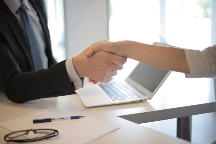 Photo by Andrea Piacquadio from Pexels: https://www.pexels.com/photo/person-in-black-suit-hired-an-employee-3760069/