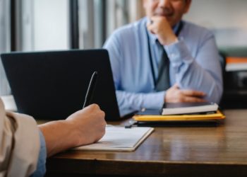 Photo by Sora Shimazaki from Pexels: https://www.pexels.com/photo/woman-filling-job-application-form-in-office-with-boss-5668858/