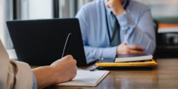 Photo by Sora Shimazaki from Pexels: https://www.pexels.com/photo/woman-filling-job-application-form-in-office-with-boss-5668858/