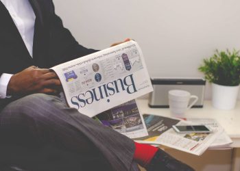 Photo by nappy from Pexels: https://www.pexels.com/photo/man-reading-newspaper-while-sitting-near-table-with-smartphone-and-cup-935979/