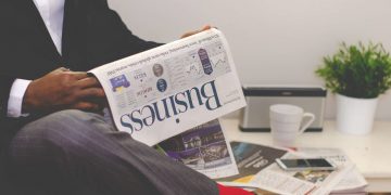 Photo by nappy from Pexels: https://www.pexels.com/photo/man-reading-newspaper-while-sitting-near-table-with-smartphone-and-cup-935979/