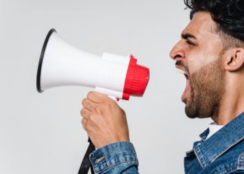 Photo by Sora Shimazaki from Pexels: https://www.pexels.com/photo/man-in-blue-denim-jacket-holding-a-megaphone-5935755/