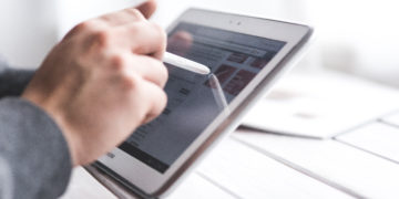 Photo by Kaboompics .com from Pexels: https://www.pexels.com/photo/hand-using-stylus-pen-for-touching-the-digital-tablet-screen-6336/
