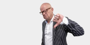 Photo by Mike van Schoonderwalt from Pexels: https://www.pexels.com/photo/a-man-flashing-the-thumbs-down-sign-5511613/