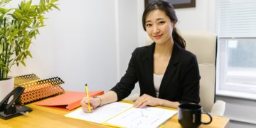Photo by RODNAE Productions: https://www.pexels.com/photo/woman-in-black-blazer-sitting-at-the-table-7845470/