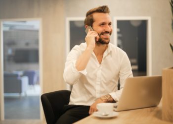Photo by Andrea Piacquadio from Pexels: https://www.pexels.com/photo/smiling-formal-male-with-laptop-chatting-via-phone-3760263/