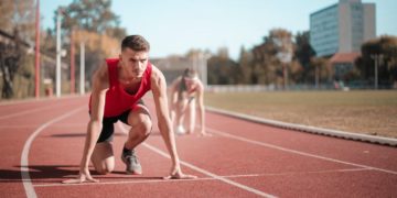 Photo by Andrea Piacquadio from Pexels: https://www.pexels.com/photo/strong-sportsmen-ready-for-running-on-stadium-3764011/
