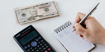 Photo by Karolina Grabowska from Pexels: https://www.pexels.com/photo/crop-anonymous-financier-planning-budget-writing-numbers-in-notebook-4386339/