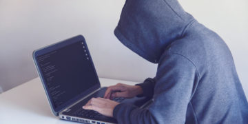 Photo by Nikita Belokhonov from Pexels: https://www.pexels.com/photo/anonymous-hacker-with-on-laptop-in-white-room-5829726/