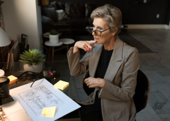 Photo by RODNAE Productions from Pexels: https://www.pexels.com/photo/a-woman-wearing-a-gray-blazer-holding-a-pen-5921659/