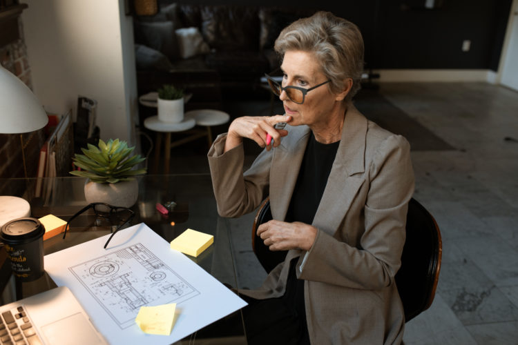 Photo by RODNAE Productions from Pexels: https://www.pexels.com/photo/a-woman-wearing-a-gray-blazer-holding-a-pen-5921659/