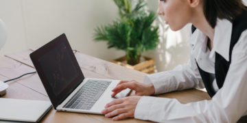 Photo by Mikhail Nilov from Pexels: https://www.pexels.com/photo/a-woman-looking-at-a-chart-on-the-laptop-screen-7677898/