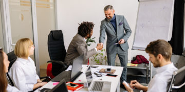 Photo by Yan Krukov from Pexels: https://www.pexels.com/photo/men-shaking-hands-at-the-meeting-7794049/