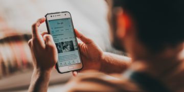 Photo by Matheus Bertelli from Pexels: https://www.pexels.com/photo/crop-man-surfing-internet-on-smartphone-at-home-3856050/
