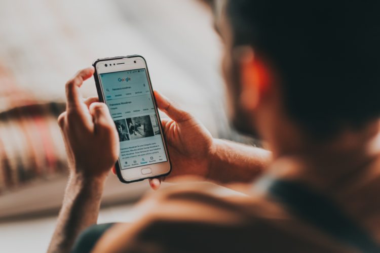 Photo by Matheus Bertelli from Pexels: https://www.pexels.com/photo/crop-man-surfing-internet-on-smartphone-at-home-3856050/