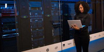 Photo by Christina Morillo from Pexels: https://www.pexels.com/photo/software-engineer-standing-beside-server-racks-1181354/