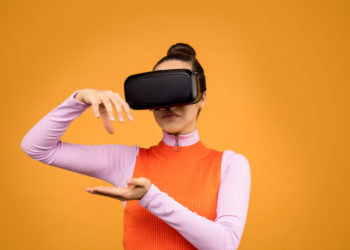 Photo by Sound On from Pexels: https://www.pexels.com/photo/woman-in-long-sleeve-shirt-wearing-black-vr-goggles-3761151/