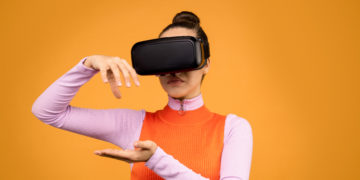 Photo by Sound On from Pexels: https://www.pexels.com/photo/woman-in-long-sleeve-shirt-wearing-black-vr-goggles-3761151/