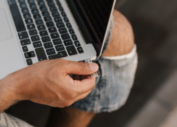 Photo by Anete Lusina from Pexels: https://www.pexels.com/photo/male-remote-worker-inserting-usb-stick-into-port-4792741/