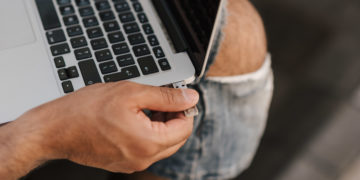 Photo by Anete Lusina from Pexels: https://www.pexels.com/photo/male-remote-worker-inserting-usb-stick-into-port-4792741/