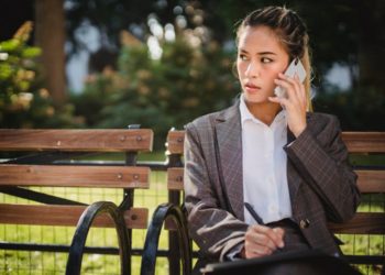 Photo by Ketut Subiyanto from Pexels: https://www.pexels.com/photo/business-woman-in-suit-on-park-bench-talking-on-mobile-4962784/
