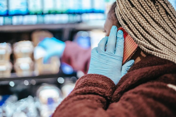 Photo by Laura James from Pexels: https://www.pexels.com/photo/black-woman-talking-on-smartphone-while-shopping-in-store-6097942/