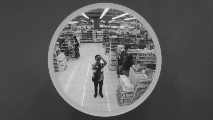Photo by Nothing Ahead from Pexels: https://www.pexels.com/photo/photographer-taking-photo-in-round-security-mirror-7452040/