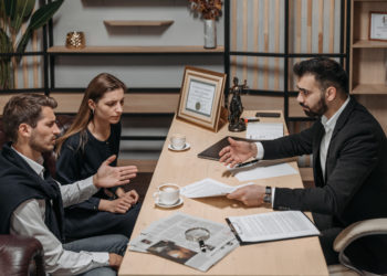 Photo by Pavel Danilyuk from Pexels: https://www.pexels.com/photo/male-lawyer-talking-to-his-clients-8112231/