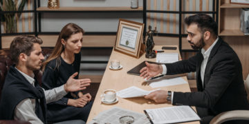 Photo by Pavel Danilyuk from Pexels: https://www.pexels.com/photo/male-lawyer-talking-to-his-clients-8112231/