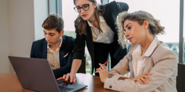 Photo by Alena Darmel from Pexels: https://www.pexels.com/photo/woman-in-white-blazer-sitting-beside-woman-in-black-blazer-8133858/